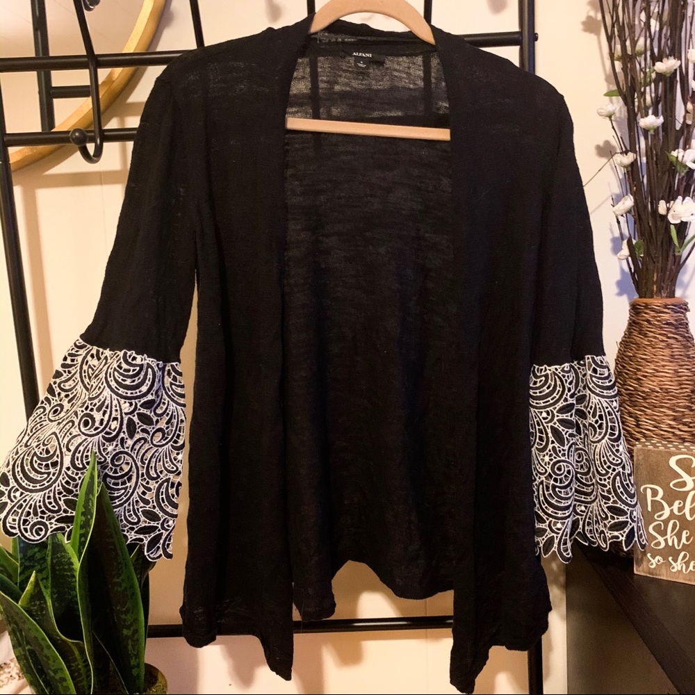 Sweater with detailed sleeves